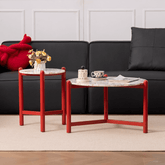 Round side table with vibrant red terrazzo top, featuring a modern minimalist design main product image